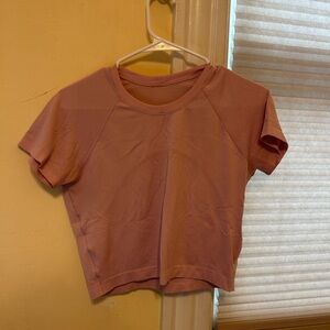 Pink lululemon crop top